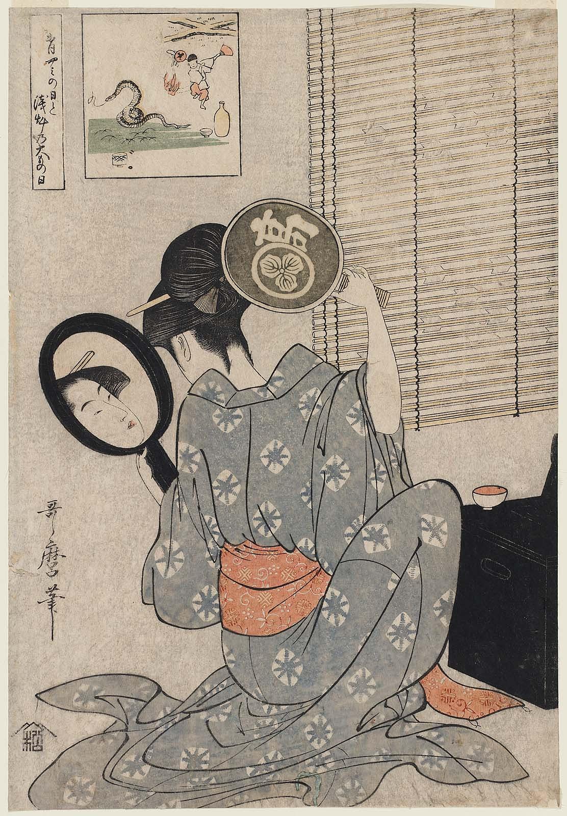 Japanese woman grooming herself and looking in the mirror