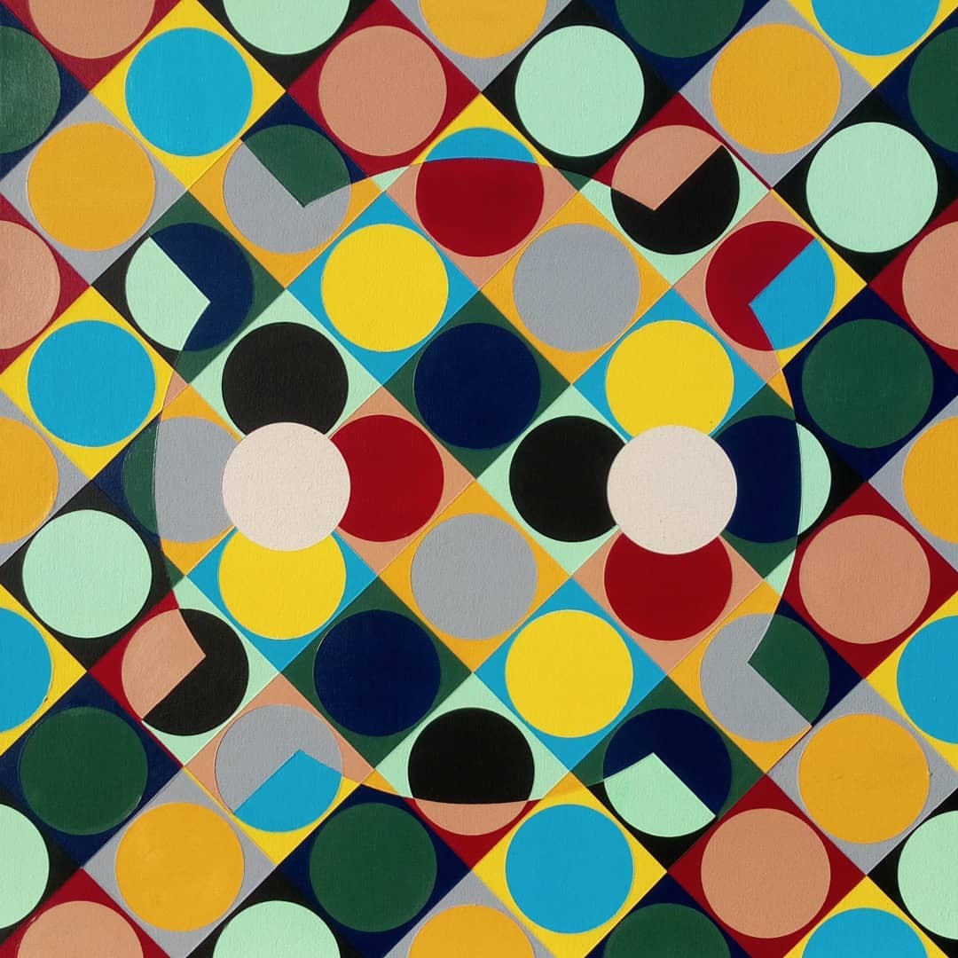 Multi-colored circles inside multi-colored squares.